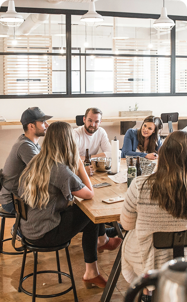 Team collaborating in work space